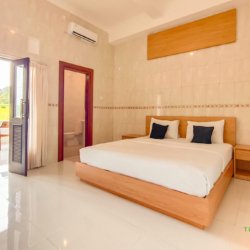 Spacious ground floor bedroom at Alit Tanah Lot house rental