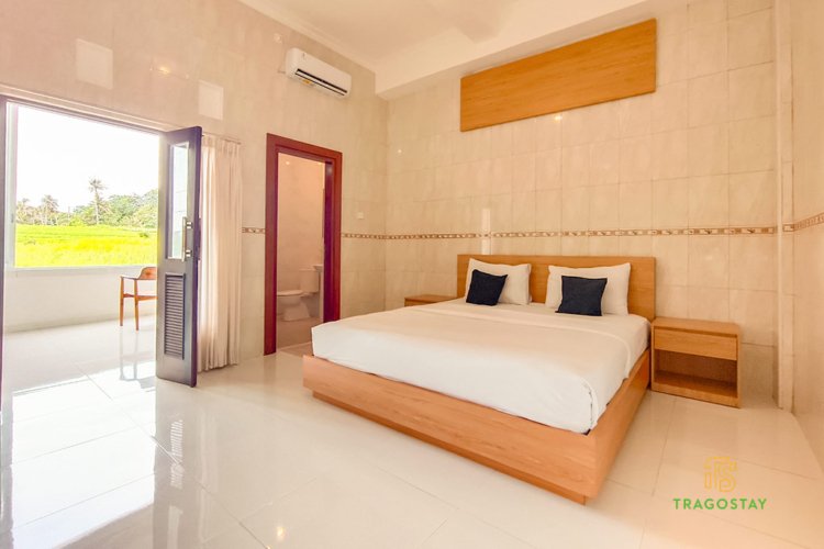 Spacious ground floor bedroom at Alit Tanah Lot house rental