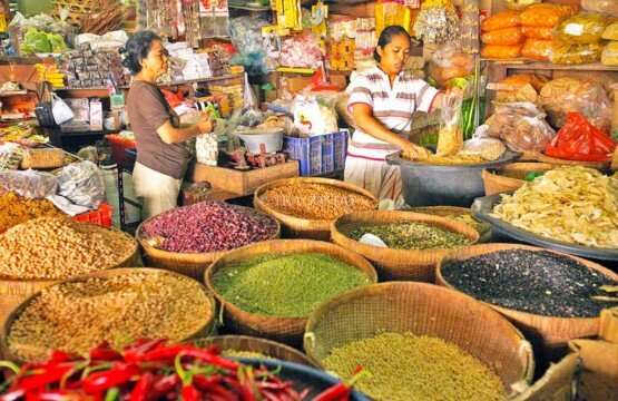 Authentic ingredient corner at Badung Market with Balinese spices and aromatic herbs.