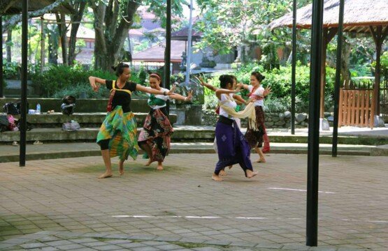Intricate choreography practice at Bali Art Center for upcoming cultural festivals.