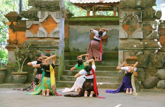 Local artists engaging in Bali Art Center dance practices, a popular Bali tourist attraction.