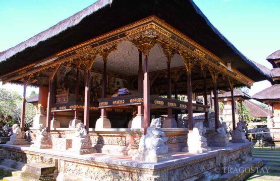 Ornate Balinese traditional architecture and wood carvings in Batuan Temple Bali.