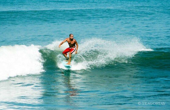 Exciting Berawa Beach surfing experience at one of the favorite Bali tourist attractions.