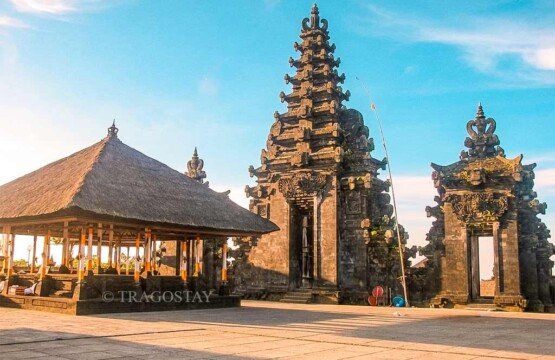 A traditional Balinese Bale and ornate entrance gate at the Besakih Temple main complex.