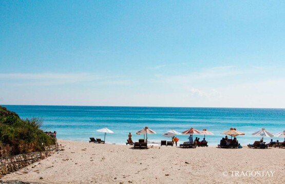 Colorful beach umbrellas at Dreamland Beach, one of the best Bali holiday spots.