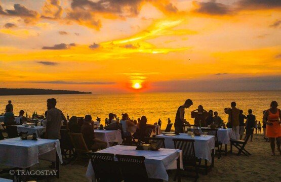 Fresh grilled Jimbaran Beach seafood dinner experience at Bali tourist attractions.