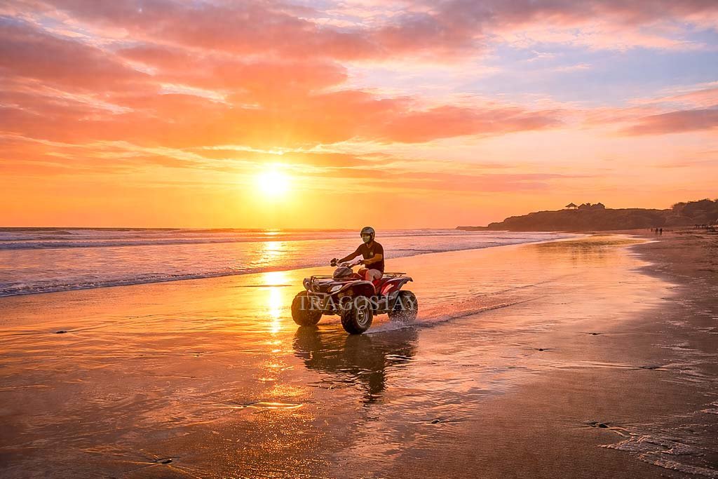 Tourists experience a guided ATV adventure on Kelating Beach, a top Bali attraction.