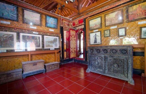 Le Mayeur Museum gallery featuring impressionist paintings at popular Bali tourist attractions.