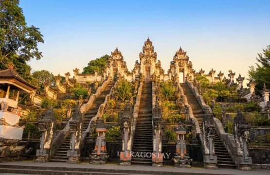 The three grand stone staircases at Lempuyang Madia Temple featuring intricate Balinese carvings.
