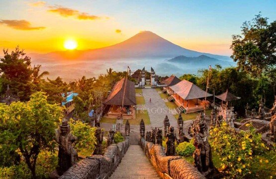 A breathtaking sunrise overview of the Penataran Agung Temple within the Lempuyang complex.