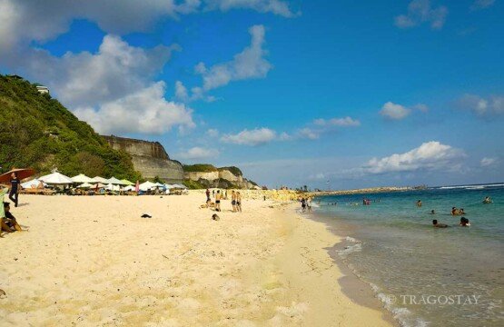 Sunny day view of Melasti Beach favorite Bali tourist attractions with turquoise water.