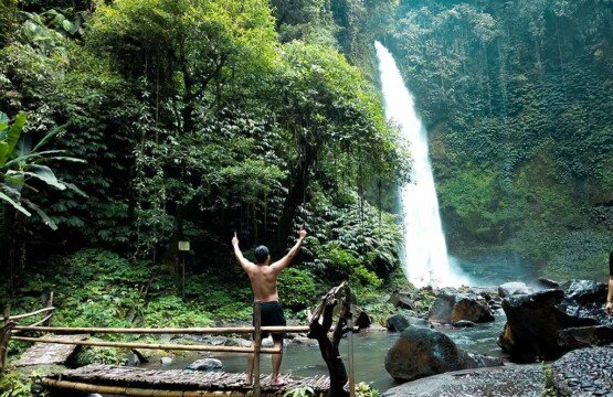 Nungnung Waterfall Bali a popular tourist attraction in Badung Regency with massive water flow.