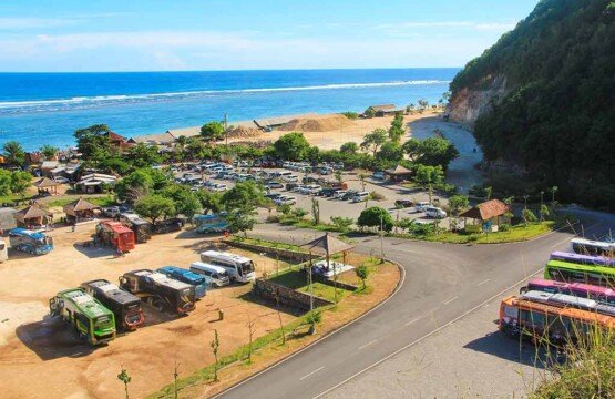 Panoramic Pandawa Beach ocean view featuring deep blue horizons and Bali tourist attractions.