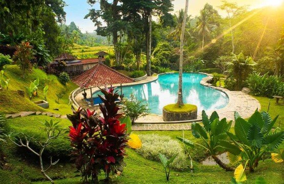 A scenic panoramic overview of the Penatahan Hot Springs complex in Tabanan.