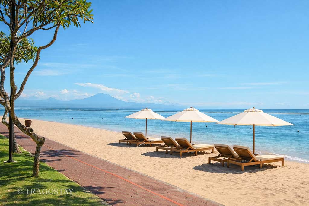 Sunny day at Sanur Beach perfect for Bali holidays and family activities.