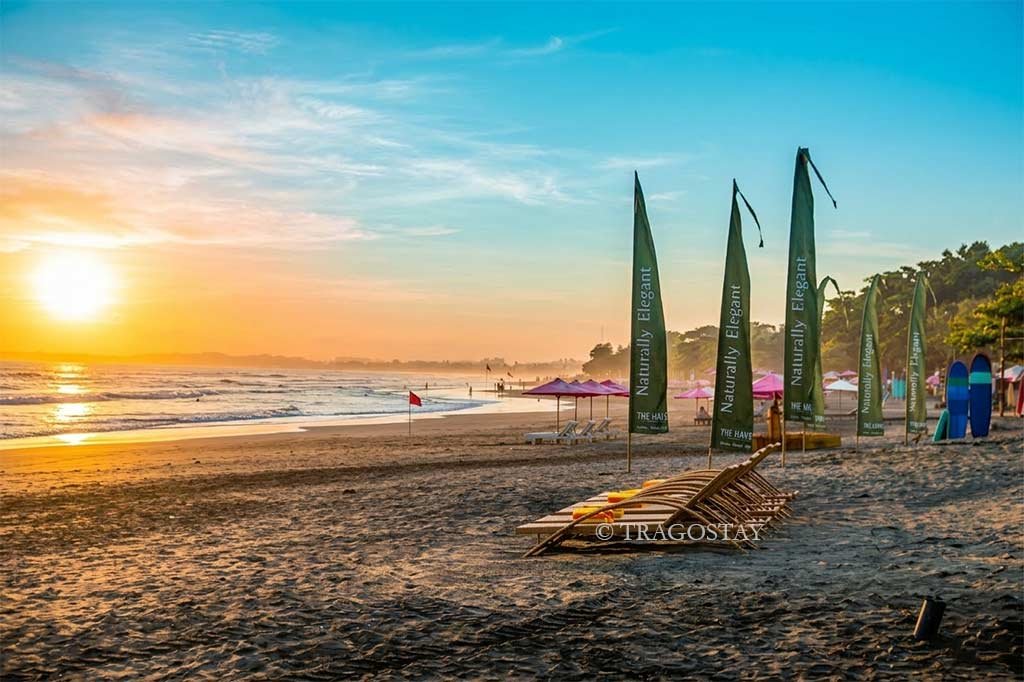 Spectacular sunset at Seminyak Beach near luxury Bali tourist places to stay.