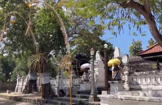 Sakenan Temple outside area at Serangan Island with traditional white stone walls.