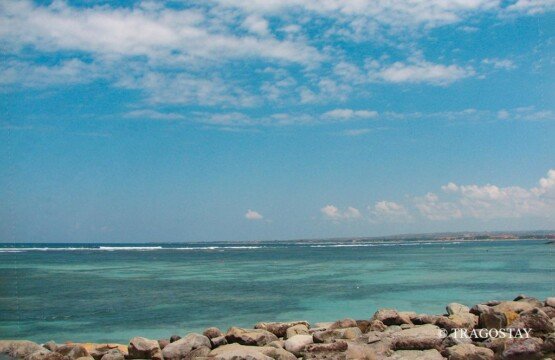 World-class surf spot at Serangan Island, one of the top Bali surf destinations.