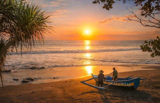 A unique view of local fishermen at work against the waves of Soka Beach.