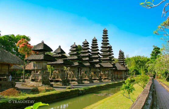 Inside view of Taman Ayun Temple featuring rows of Meru shrines and Bali tourist destinations.
