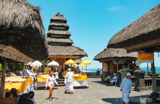 The sacred inside main temple area of Tanah Lot Temple during a religious festival.