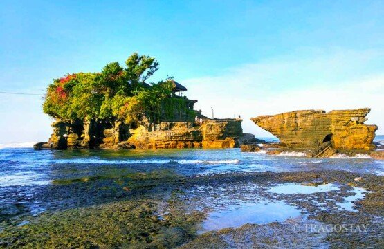 Tanah Lot Temple at morning low tide, a perfect Bali place to visit for exploration.