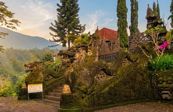 Intricate dragon statues guarding the main entrance of Vihara Dharma Giri Bali.