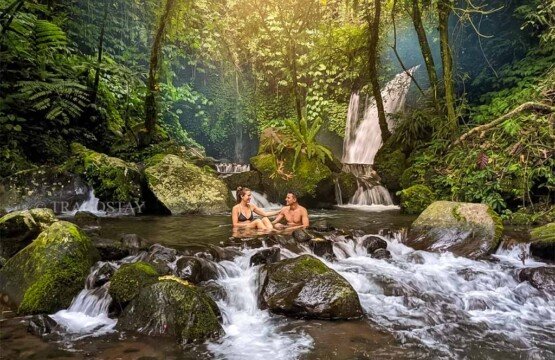 The crystal-clear natural pool at the base of Yeh Hoo Waterfall Jatiluwih.