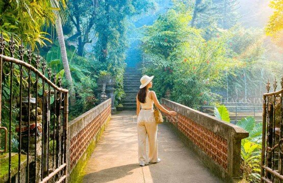 A view of the famous and iconic bridge crossing over a small river stream inside the Banjar Hot Springs wellness sanctuary.