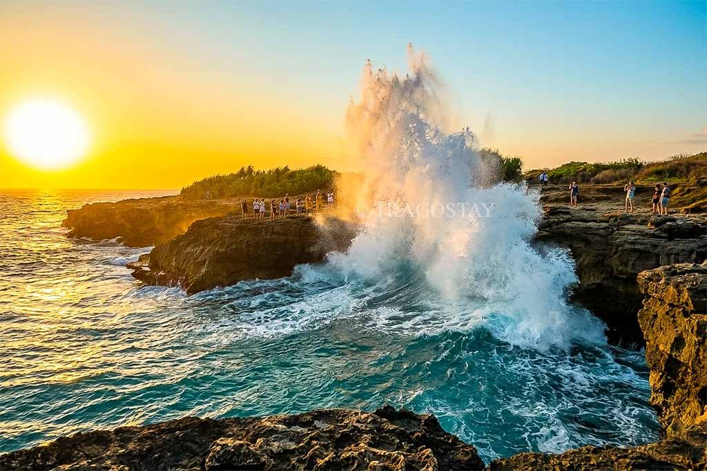 Large waves crashing violently into the cliffs of Devil’s Tears during a bright and sunny afternoon.