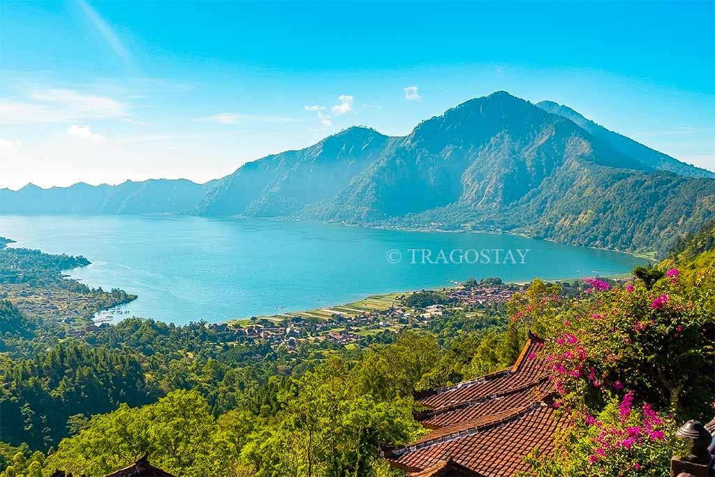 A wide scenic overview of Lake Batur from Penelokan Kintamani, showcasing the famous Balinese tourism landmark.