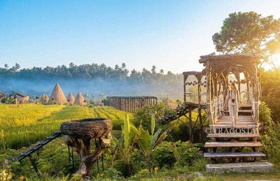 An artistic and unique wooden bridge structure serving as an iconic landmark at Maha Gangga Valley.