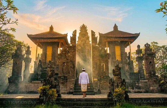 The grand main shrine structure of Meduwe Karang Temple standing majestically under the soft light of a clear morning.