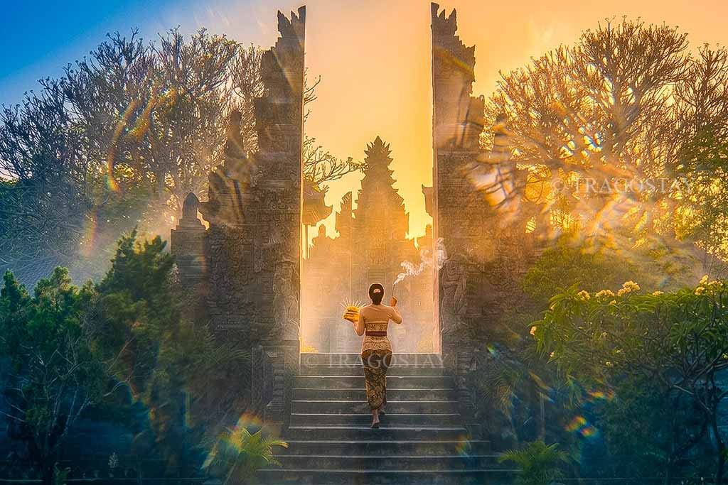 The grand and majestic main entrance gate designed in authentic North Balinese stone architecture at Meduwe Karang Temple.