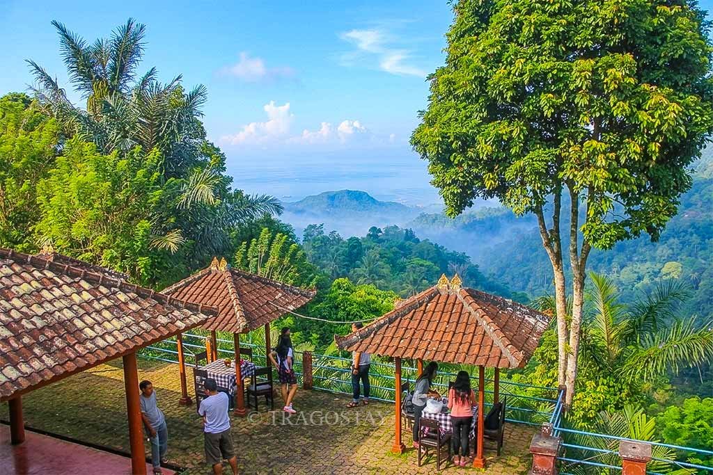 International and local tourists exploring the scenic viewpoints and natural beauty of Putung Hill in Karangasem.