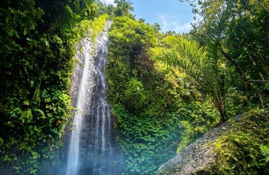 A stunning view of the cascading Yeh Labuh Waterfall hidden in the Karangasem regency of East Bali.