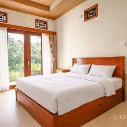 Bali home rental bedroom overlooking green rice fields