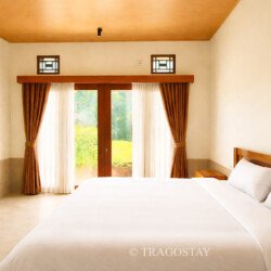 Comfortable guest bedroom offered by Bali home rental
