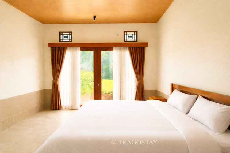 Comfortable guest bedroom offered by Bali home rental