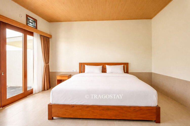 Cozy double bed setup in a Bali home rental bedroom