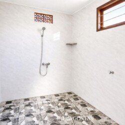 Modern private bathroom at Bali home rental with shower