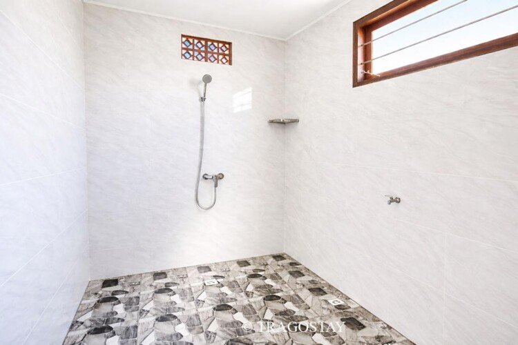 Modern private bathroom at Bali home rental with shower